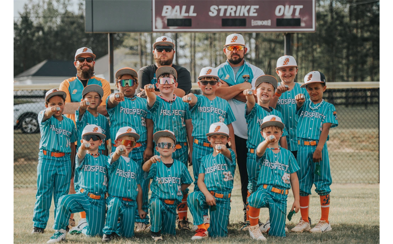 Our 8U boys showing off some Hardware for their hard work!!
